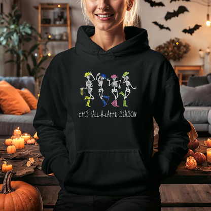 Close-up of glow-in-the-dark embroidery featuring colorful skeletons in western hats and boots