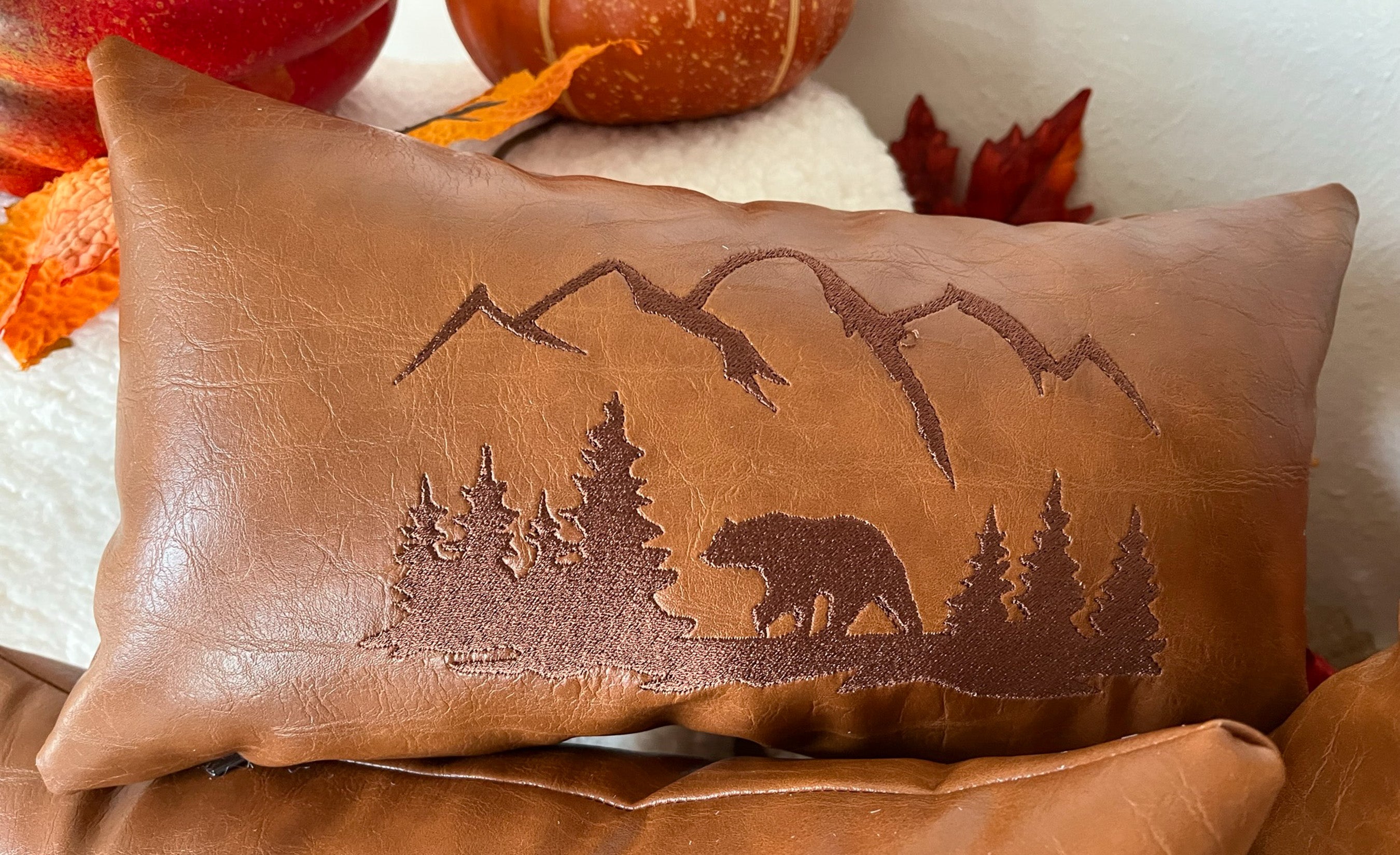 Leather bear pillow embroidered cabin decor cushion The Home and Hearth