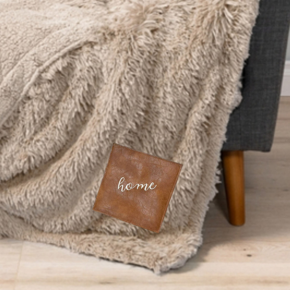 “HOME” Embroidered Patch Blanket – Non-Shedding Faux Fur Throw with Vegan Leather Patch